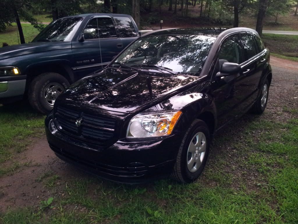And this is after with 20% tint and the dealer crap taken off and the dodge caliber badges removed.